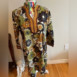 Floral Multicolor Beach Coverup. Pit to Pit 21”. Good condition.